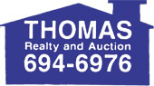 Thomas Realty logo